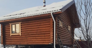Баня из оцилиндрованного бревна под ключ в Шарыпово - от 134329 рублей